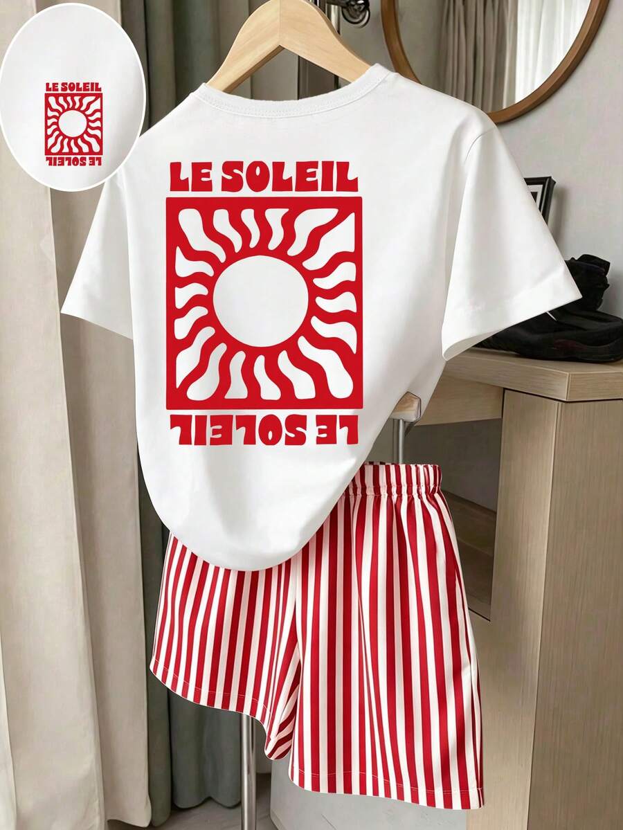 Girls' multicolor short sleeve T-shirt and shorts set featuring a cute cherry and bow print with round neck top and matching shorts.