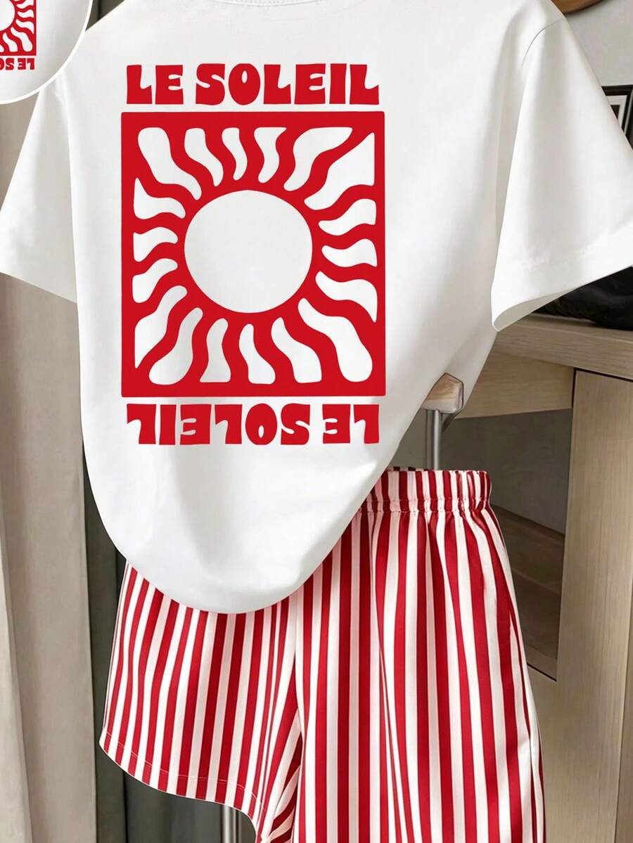 Girls' multicolor short sleeve T-shirt and shorts set featuring a cute cherry and bow print with round neck top and matching shorts.