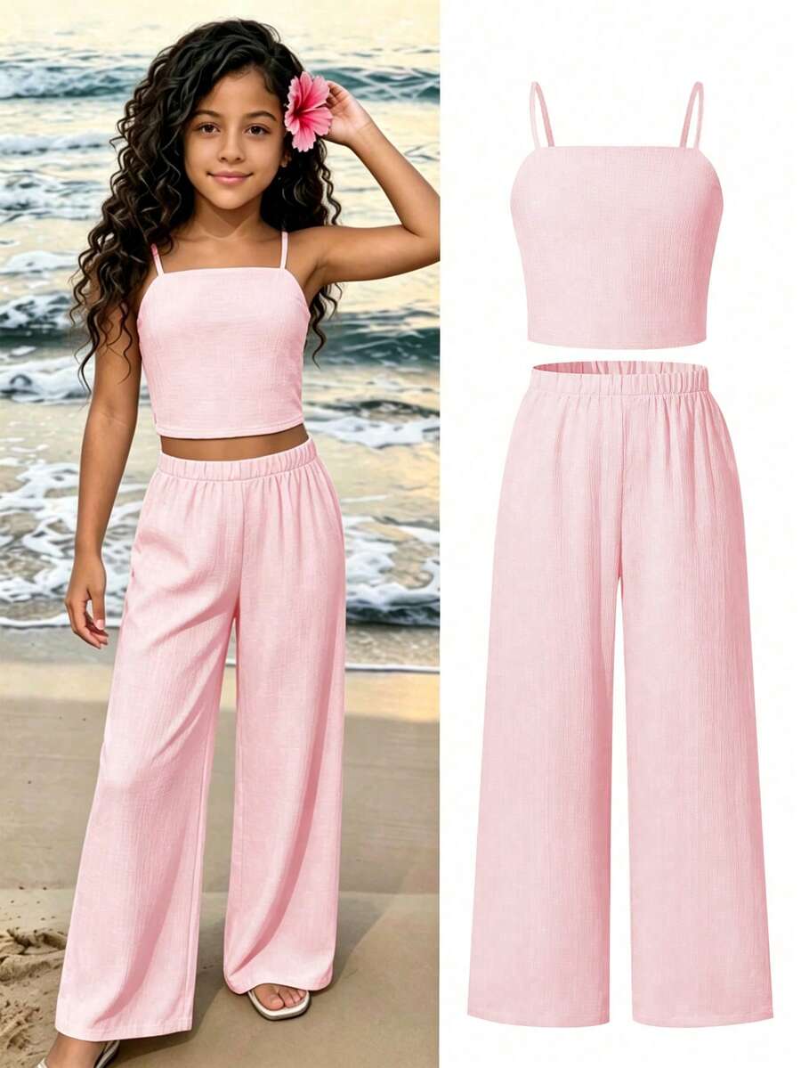 Tween girls casual 2-piece set featuring an apricot woven camisole crop top with back shirring and matching high-waisted loose long pants.