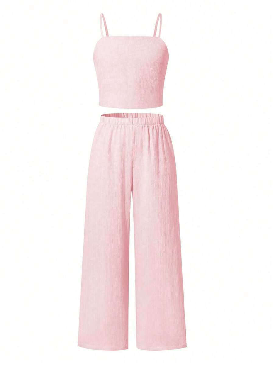 Tween girls casual 2-piece set featuring an apricot woven camisole crop top with back shirring and matching high-waisted loose long pants.