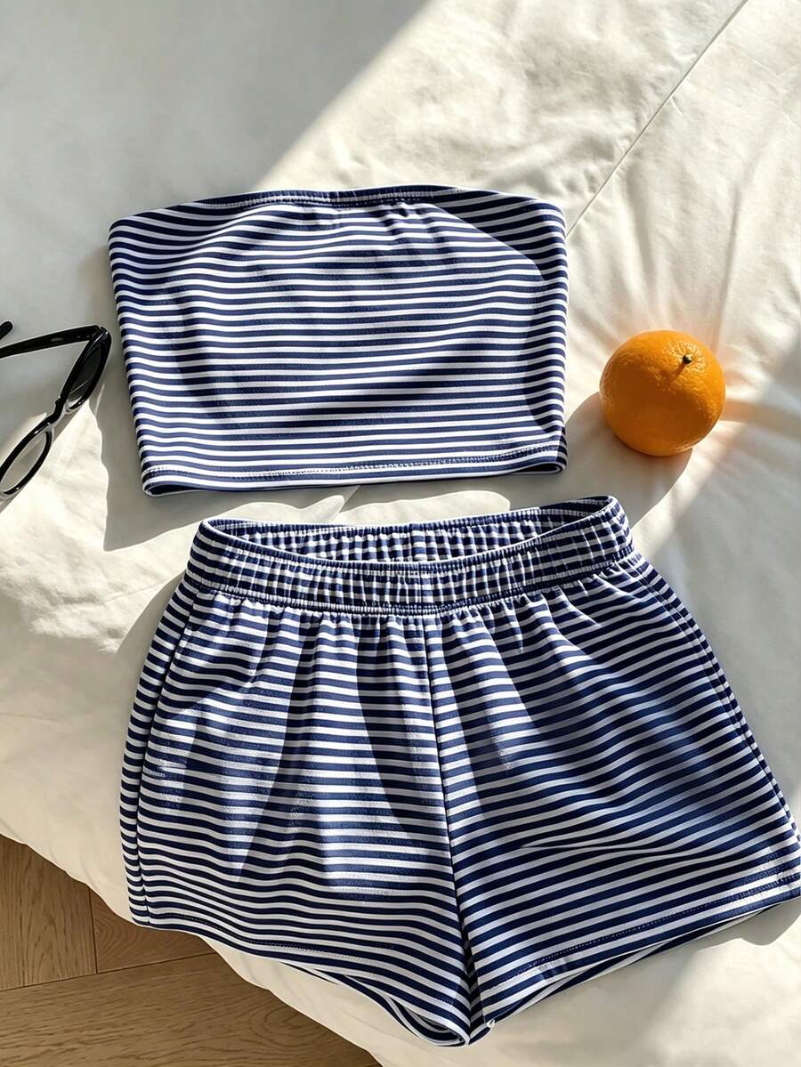 Tween girls two-piece summer outfit featuring a brown strapless tube top with contrast pink tape accent and matching brown shorts with pockets.
