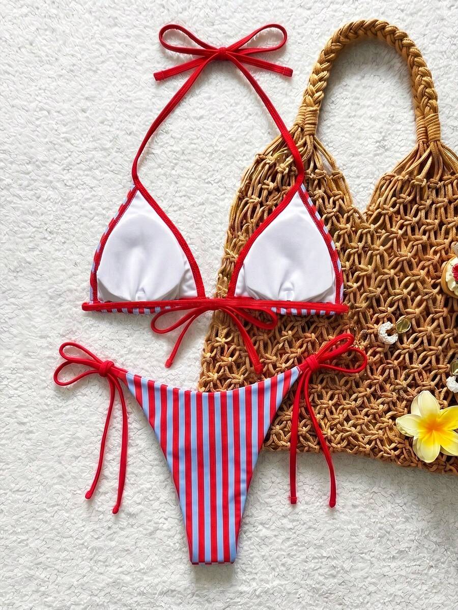 Women's beige two-piece bikini set featuring a wireless top with removable padding, spaghetti straps, tie back detail, and low waist hipster swimsuit bottoms.