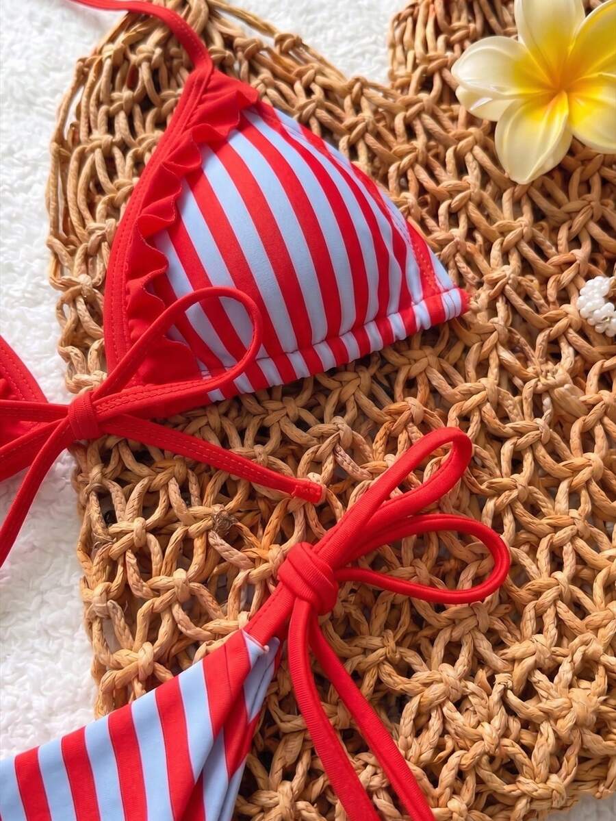 Women's beige two-piece bikini set featuring a wireless top with removable padding, spaghetti straps, tie back detail, and low waist hipster swimsuit bottoms.
