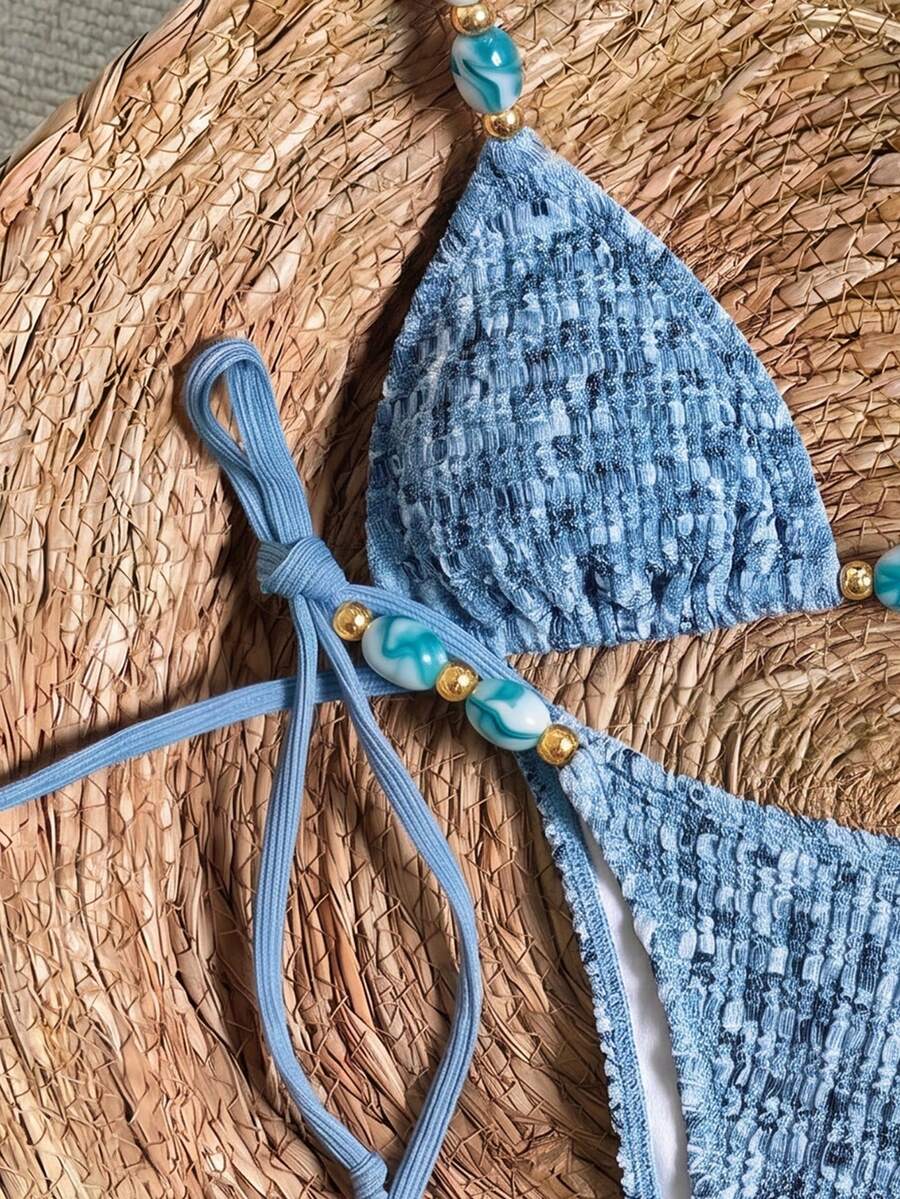 Multicolor textured beaded halter bikini set for women featuring wireless triangle cups with removable padding and ultra low waist tie side bottoms.