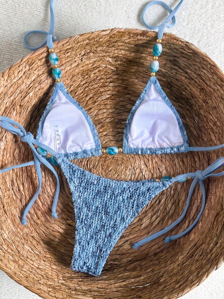 Multicolor textured beaded halter bikini set for women featuring wireless triangle cups with removable padding and ultra low waist tie side bottoms.