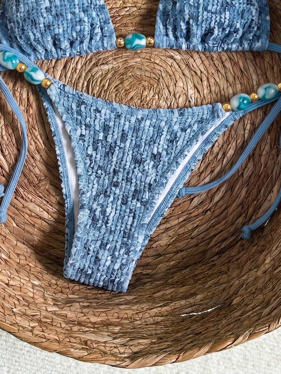 Multicolor textured beaded halter bikini set for women featuring wireless triangle cups with removable padding and ultra low waist tie side bottoms.