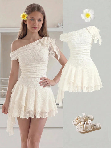 Tween girls sleeveless apricot A-line dress featuring an asymmetrical neck, contrast lace trim, and a flared hem.