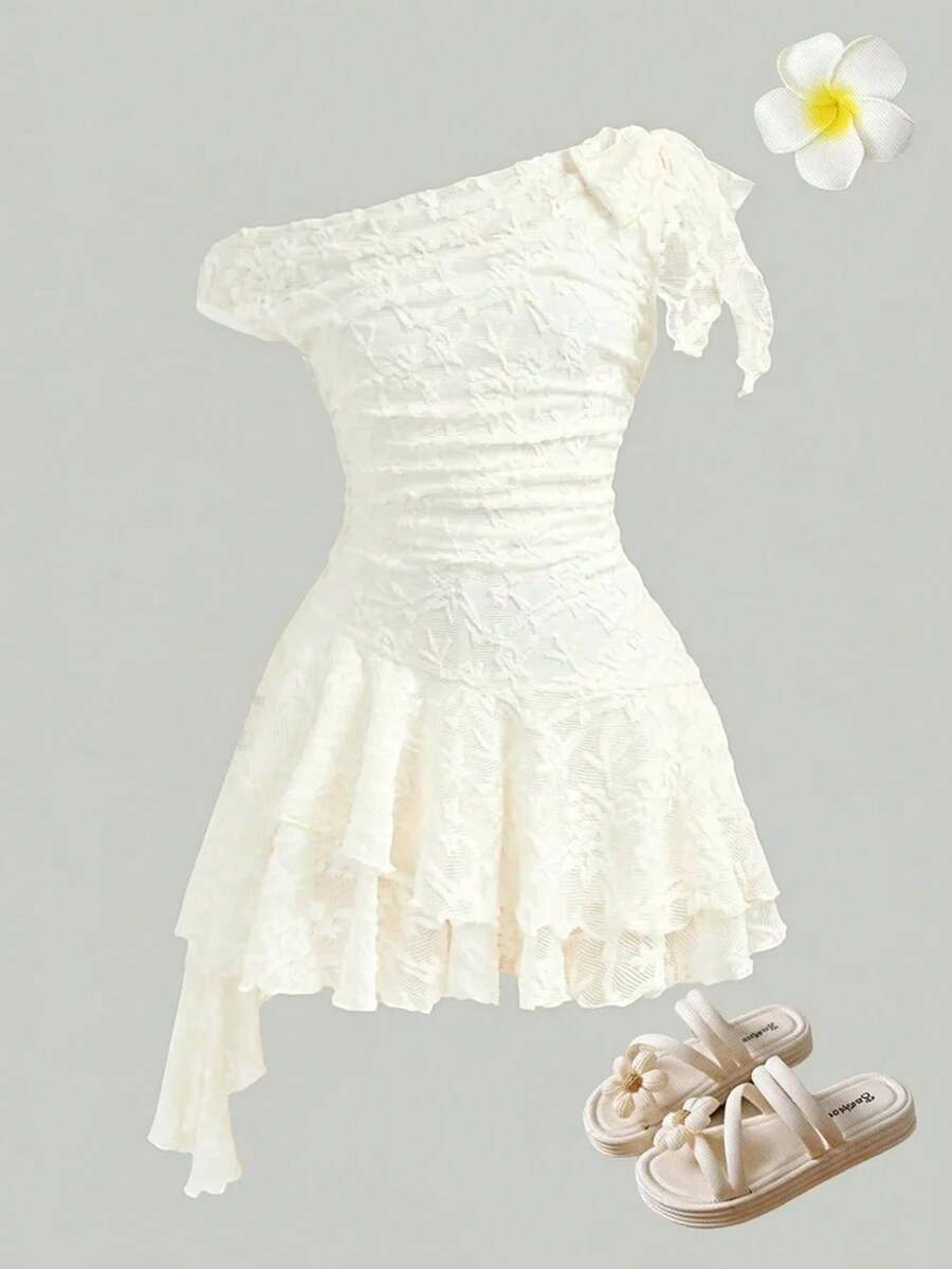 Tween girls sleeveless apricot A-line dress featuring an asymmetrical neck, contrast lace trim, and a flared hem.