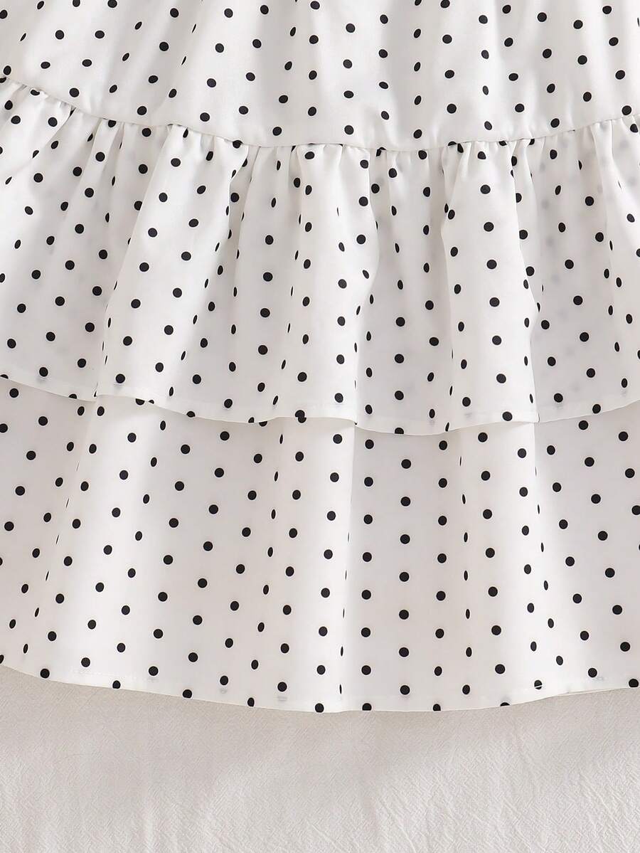 Light blue two-piece outfit set for tween girls with a sleeveless round neck vest top and a tiered ruffle cake skirt featuring a plant pattern.