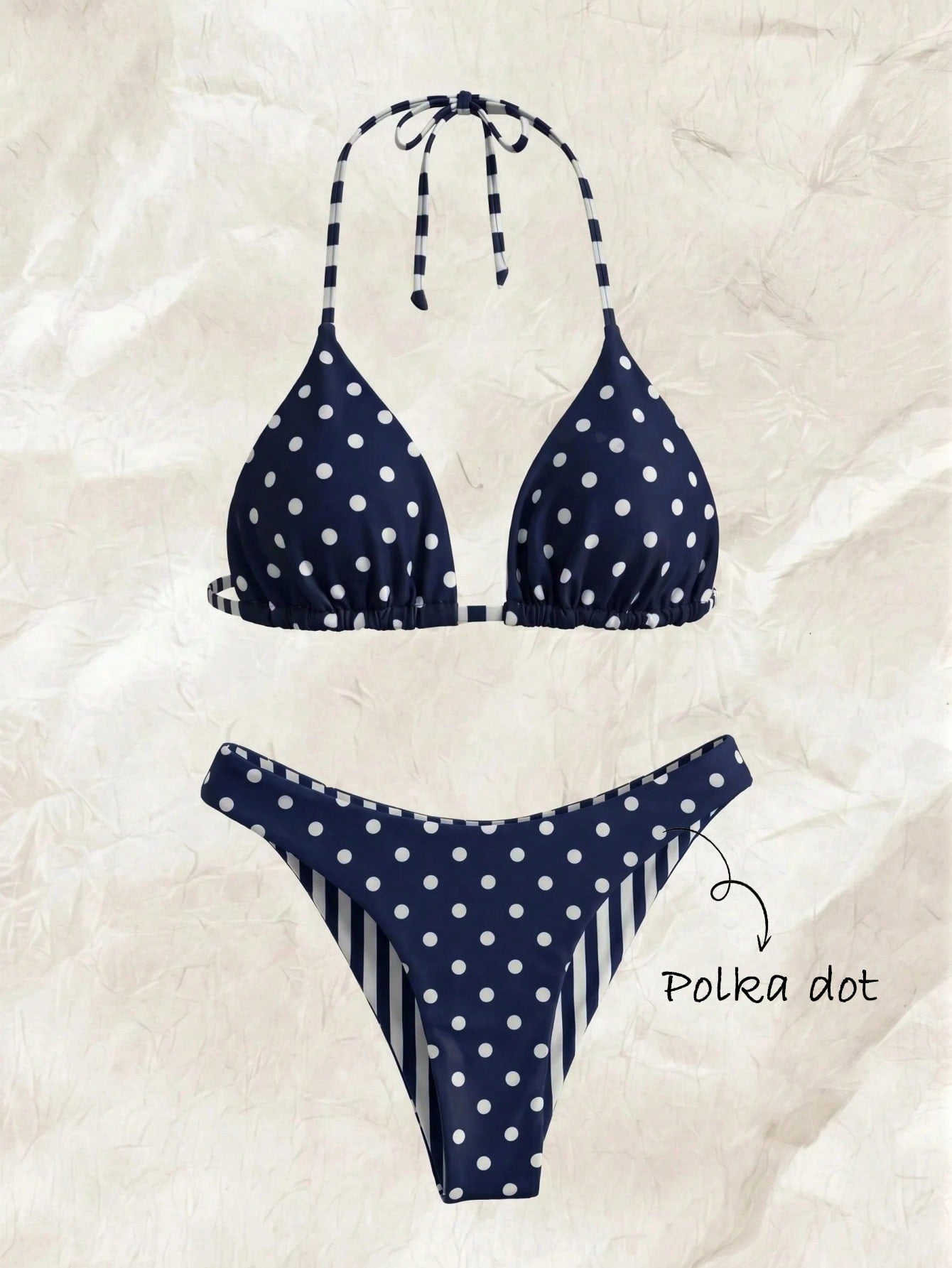 Women's two-piece halter bikini set featuring high cut thong bottoms and removable padding