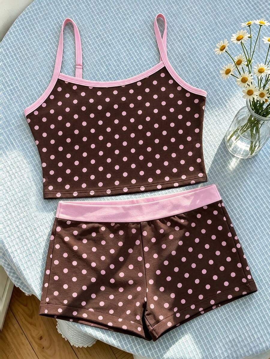 Tween girls summer 2-piece Hawaiian style outfit featuring a graphic print spaghetti strap camisole top with contrast piping and matching casual shorts.