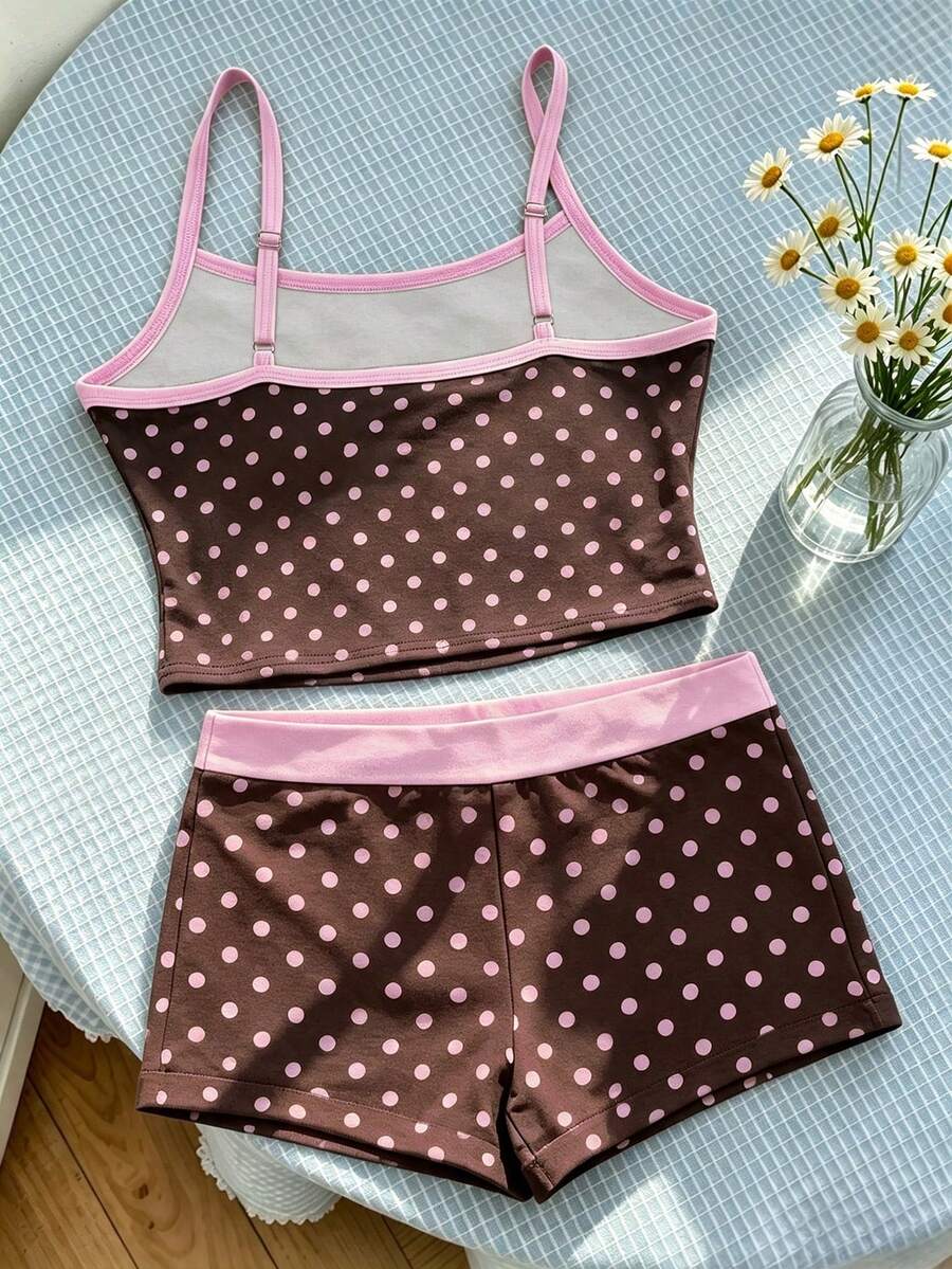 Tween girls summer 2-piece Hawaiian style outfit featuring a graphic print spaghetti strap camisole top with contrast piping and matching casual shorts.