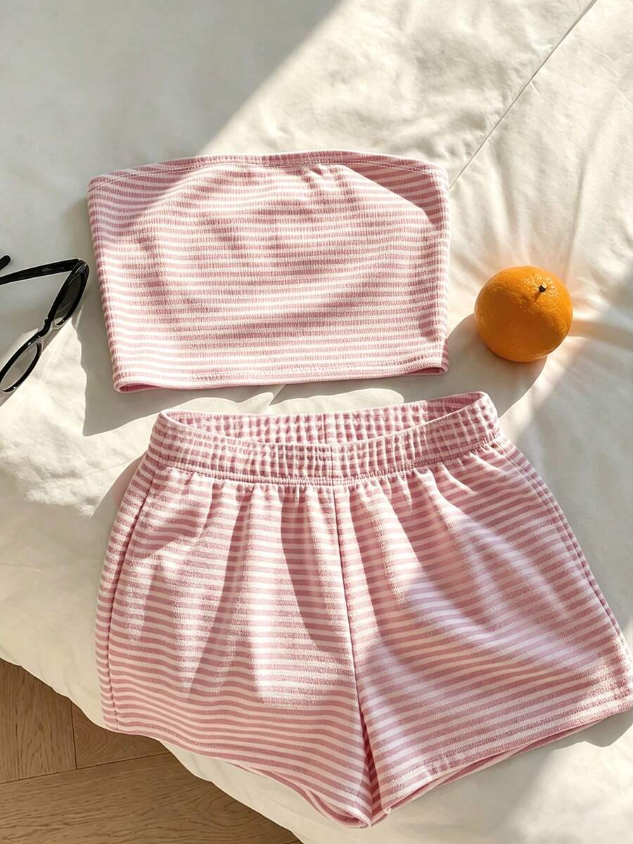 Tween girls two-piece summer outfit featuring a brown strapless tube top with contrast pink tape accent and matching brown shorts with pockets.