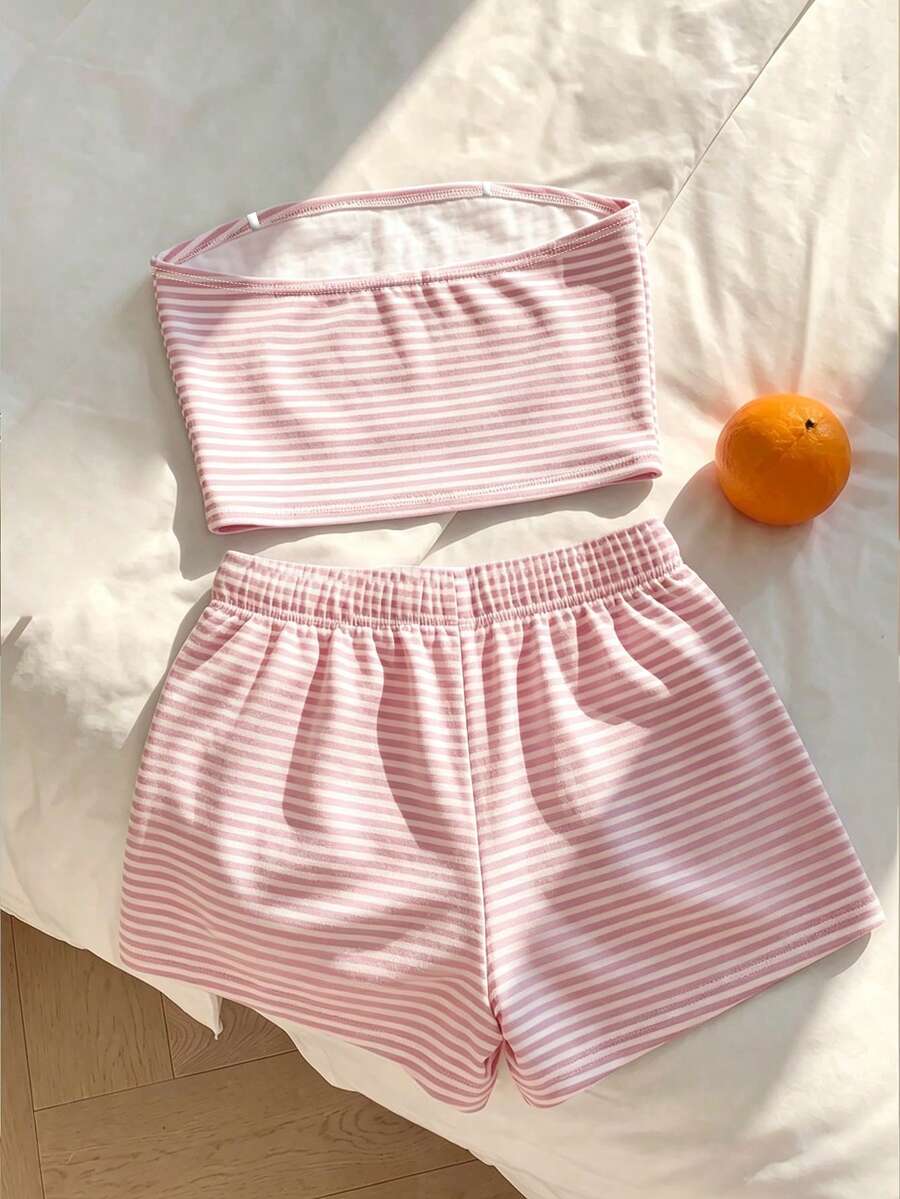 Tween girls two-piece summer outfit featuring a brown strapless tube top with contrast pink tape accent and matching brown shorts with pockets.