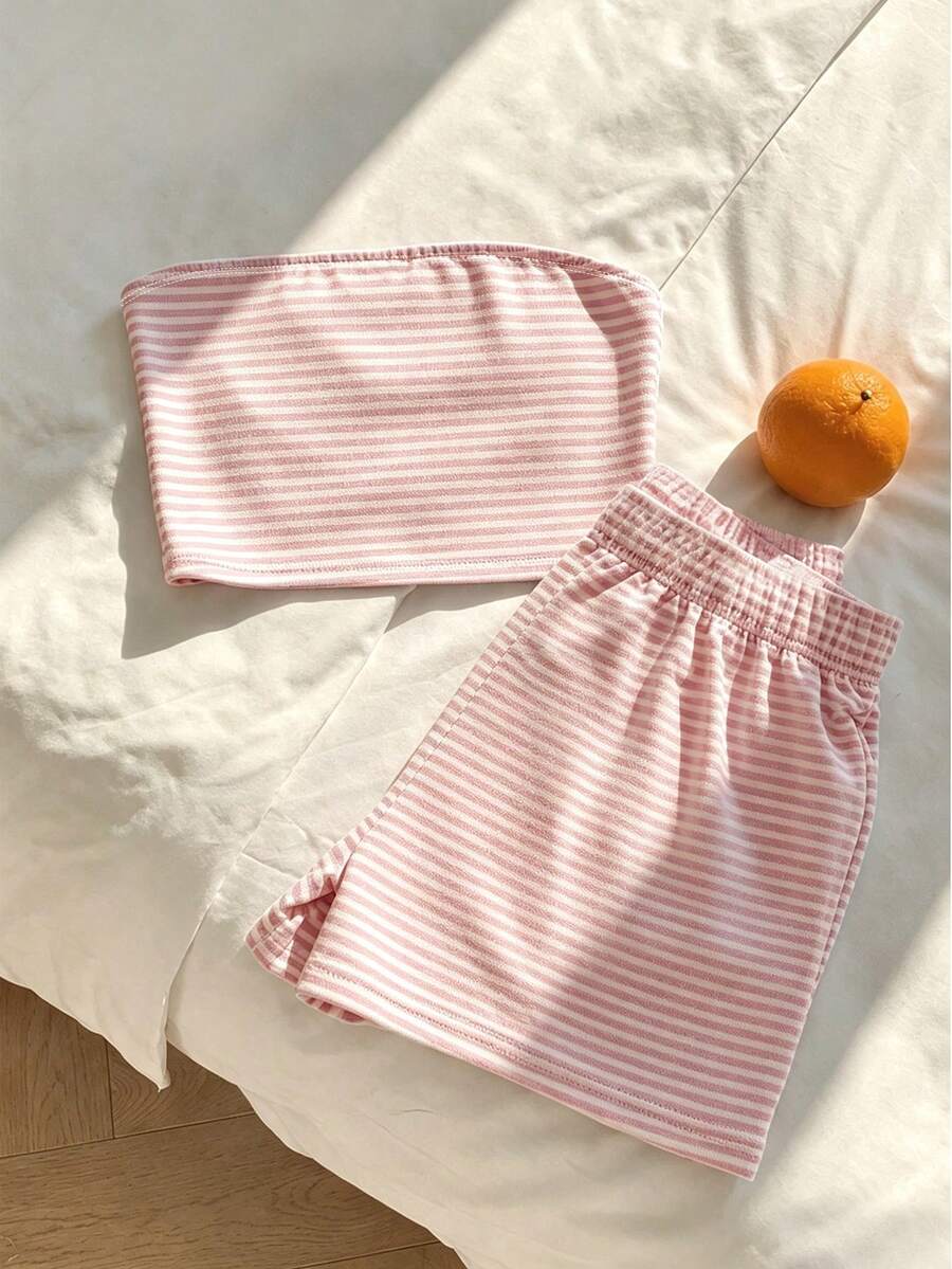 Tween girls two-piece summer outfit featuring a brown strapless tube top with contrast pink tape accent and matching brown shorts with pockets.