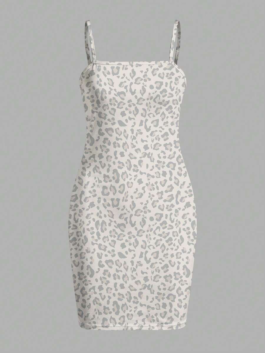Tween girls multicolor floral midi cami dress with spaghetti straps, sleeveless design, loose fit, and vacation-inspired plant print.