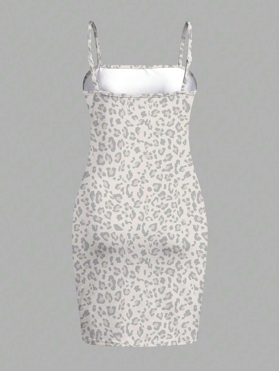 Tween girls multicolor floral midi cami dress with spaghetti straps, sleeveless design, loose fit, and vacation-inspired plant print.