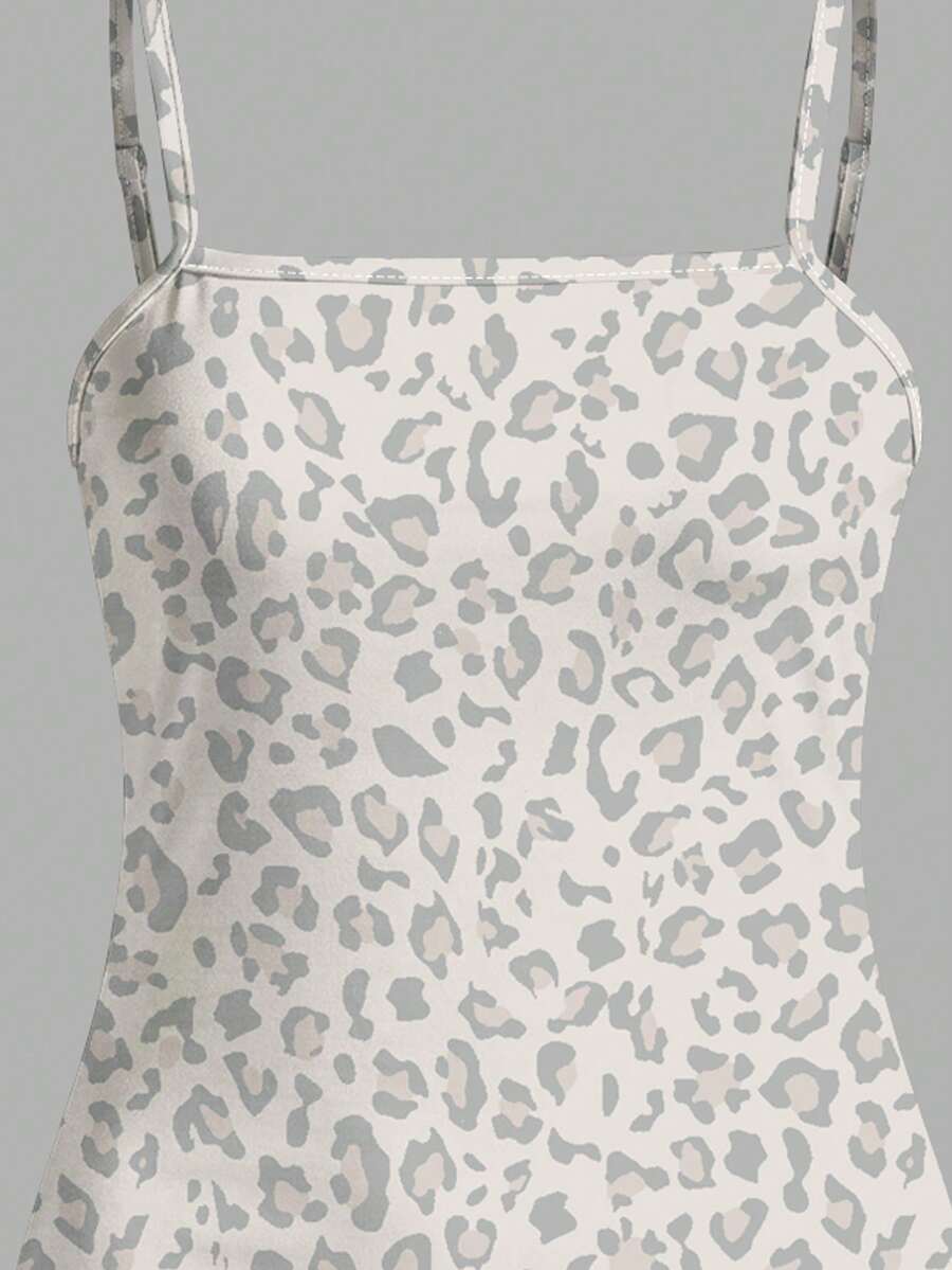 Tween girls multicolor floral midi cami dress with spaghetti straps, sleeveless design, loose fit, and vacation-inspired plant print.