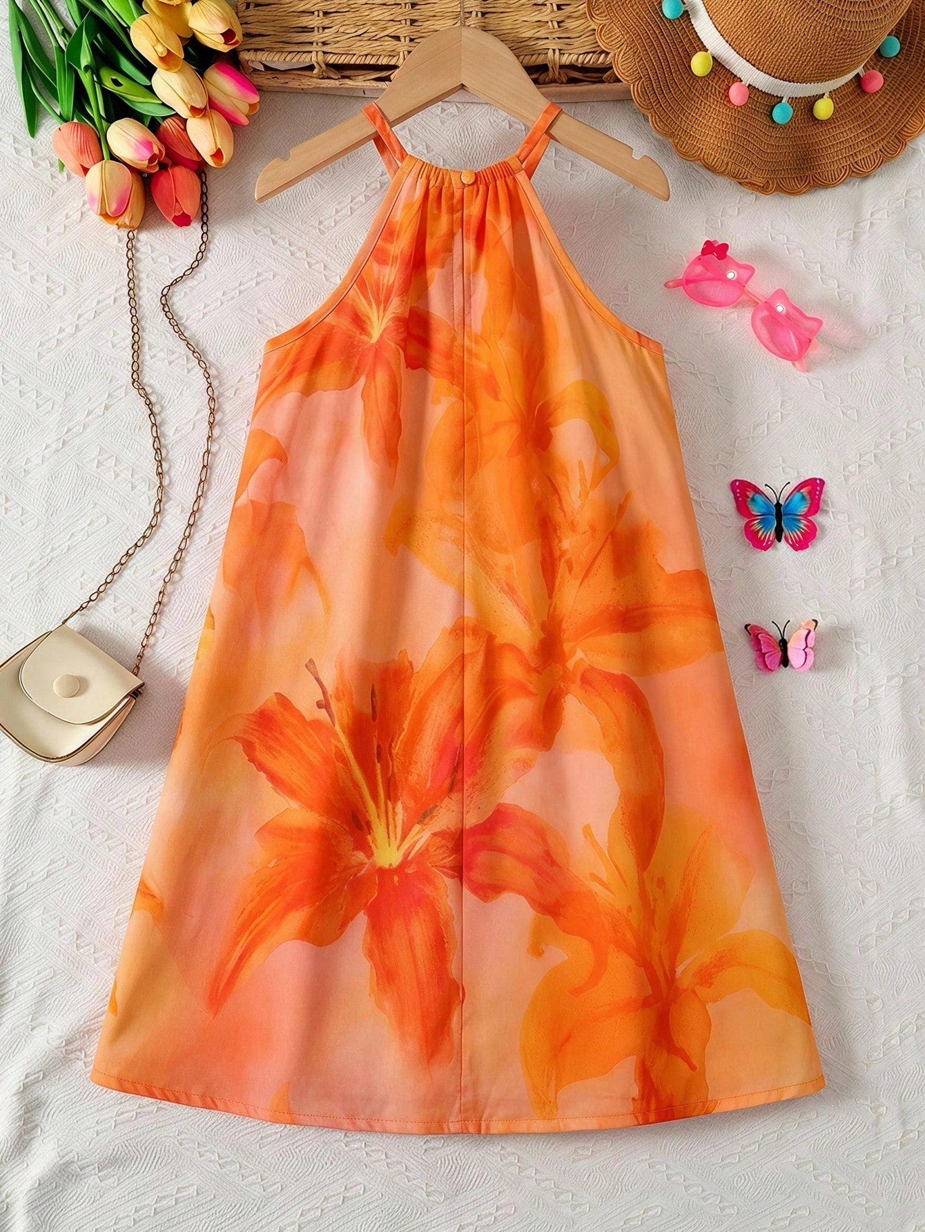 Tween girls sleeveless halter tunic dress with colorful rainbow striped colorblock pattern, button detail, short length, and regular fit for summer vacation or beach wear.