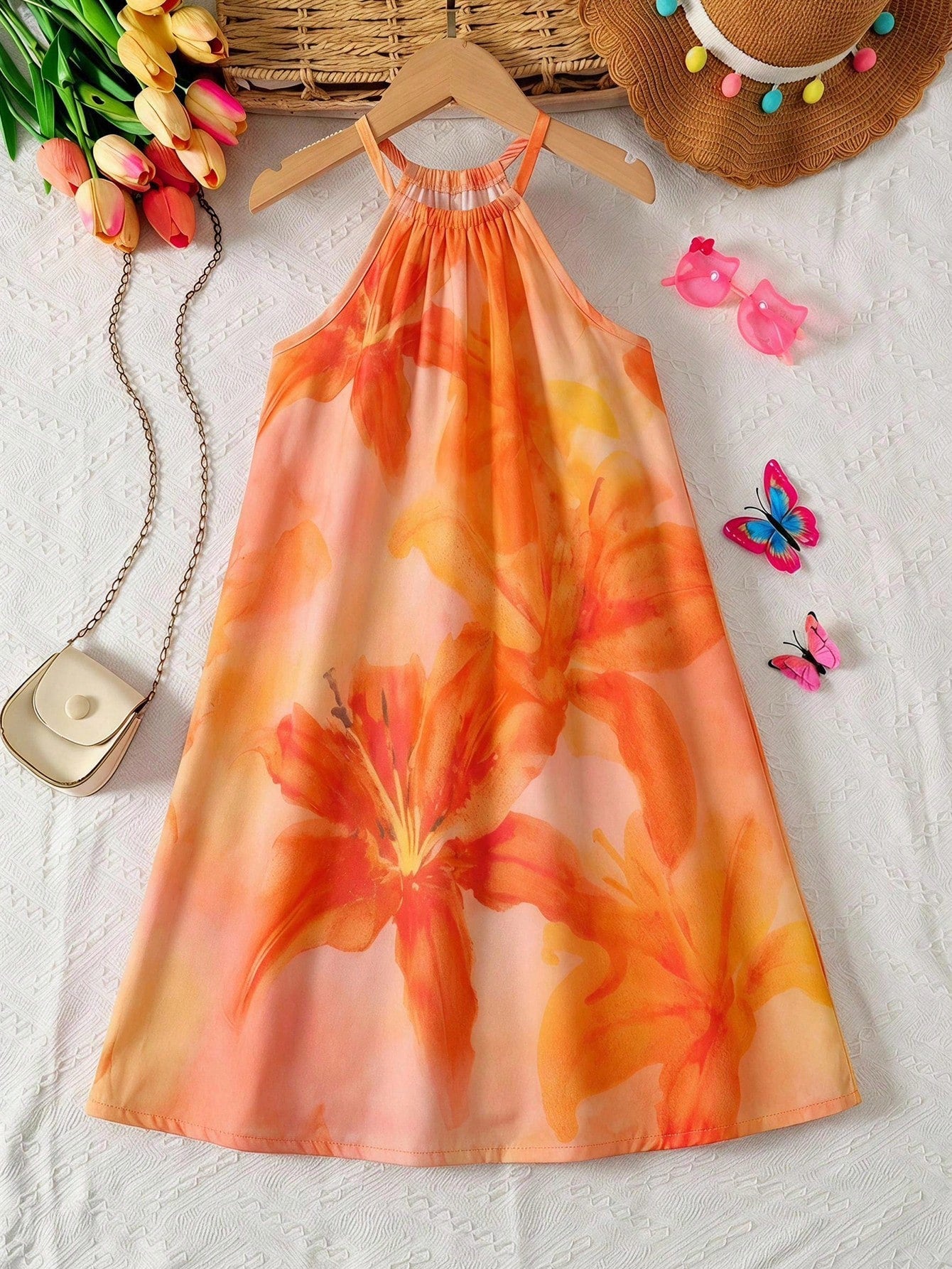 Tween girls sleeveless halter tunic dress with colorful rainbow striped colorblock pattern, button detail, short length, and regular fit for summer vacation or beach wear.