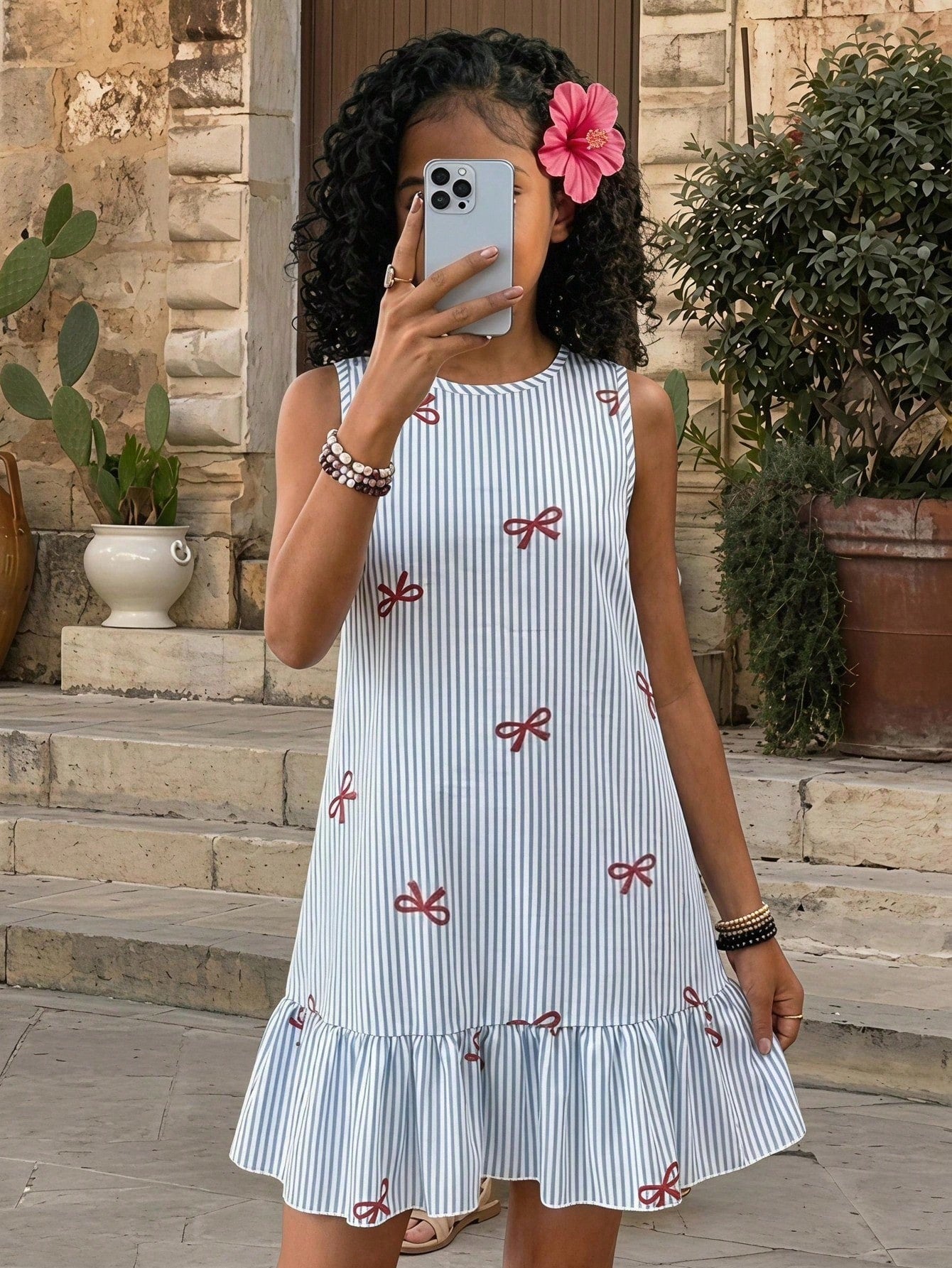 Tween girls casual leopard print smock mini dress featuring a round neck and flounce ruffle hem.