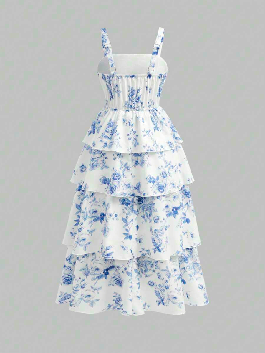 Tween girls blue ditsy floral sleeveless long dress with spaghetti straps, ruched bust, high waist, and tiered layered hem.