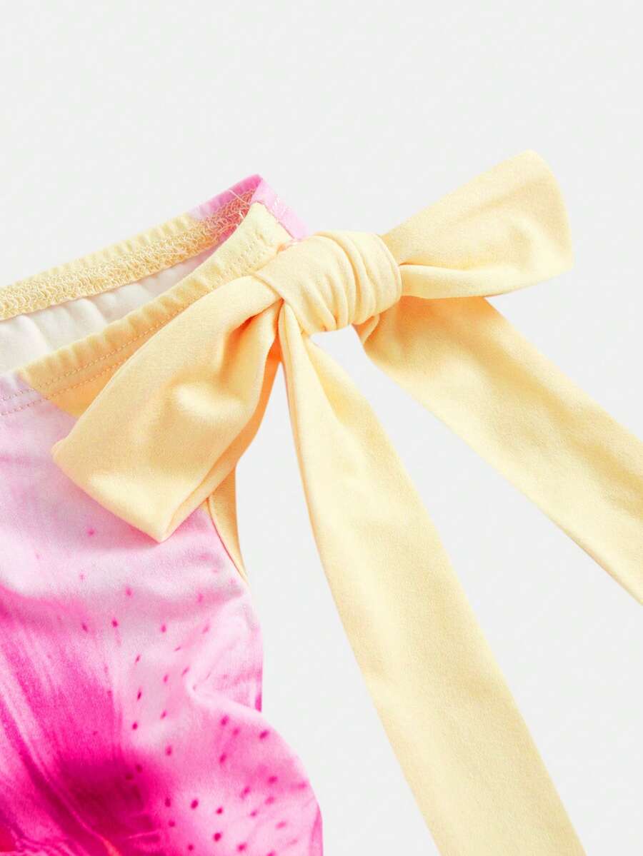 Tween girls sleeveless apricot A-line dress featuring an asymmetrical neck, contrast lace trim, and a flared hem.