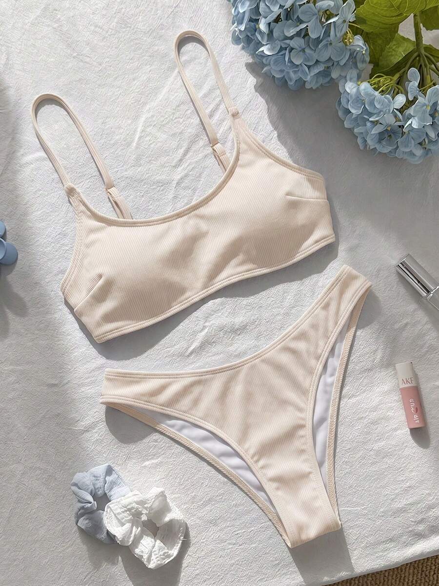 Apricot ribbed high waist two piece bikini swimsuit set for women featuring backless spaghetti strap top and high waisted bottoms.