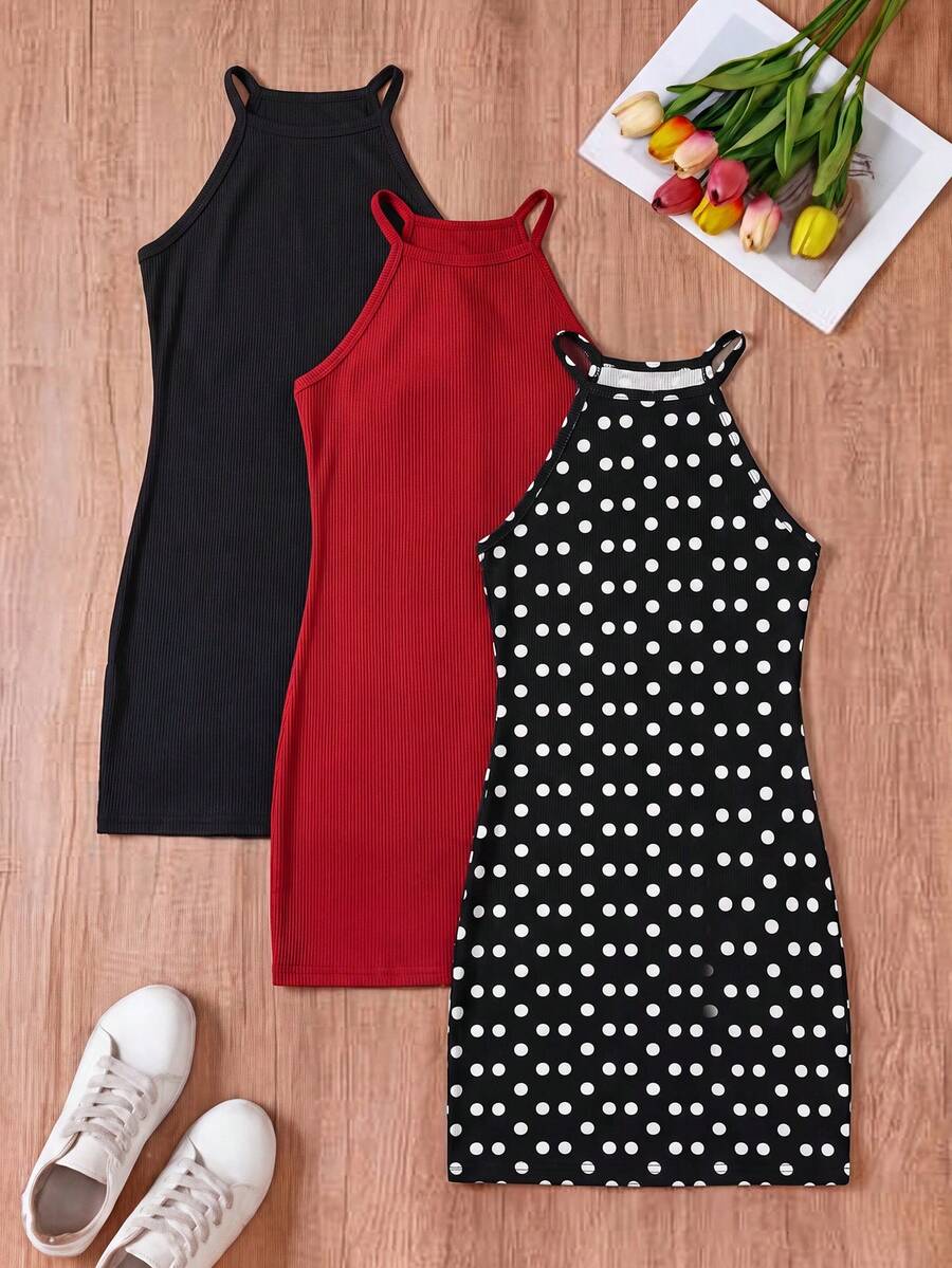 Tween girl black mini dress with halter neckline, backless design, tiered layer detail, high waist, flounce hem, and sleeveless slim fit.
