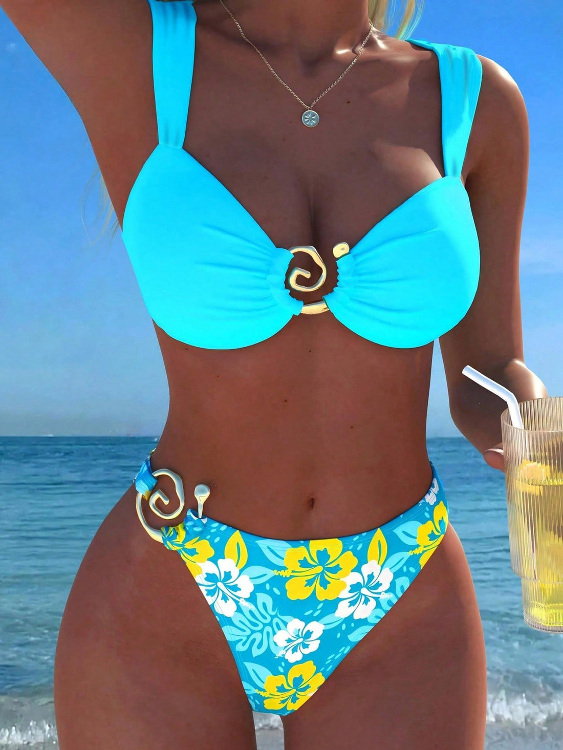 Baby blue floral print bikini set with ring strap detail and matching bikini bottoms.