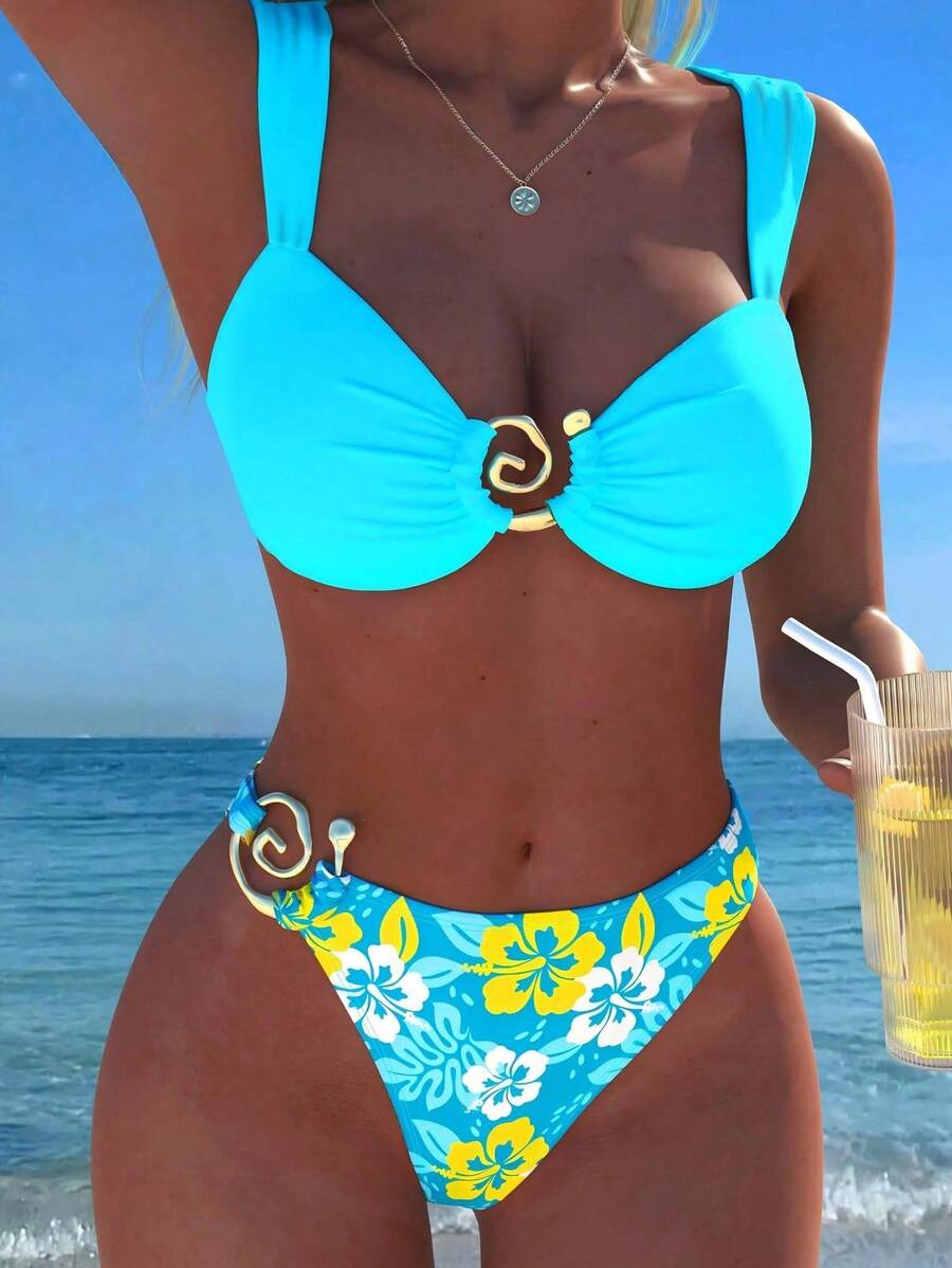 Baby blue floral print bikini set with ring strap detail and matching bikini bottoms.