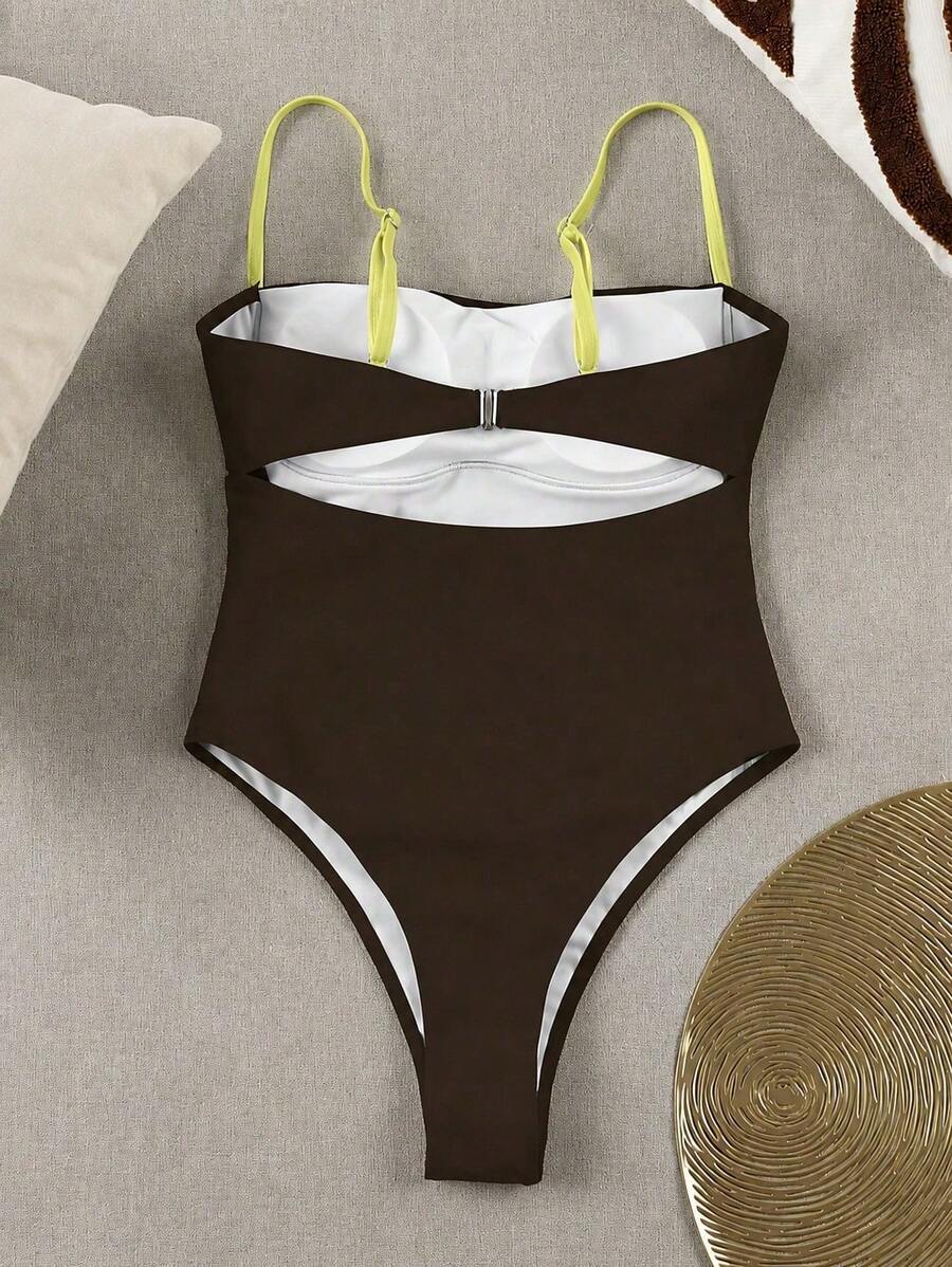 Black colorblock women's one-piece swimsuit with spaghetti straps and high stretch fabric.