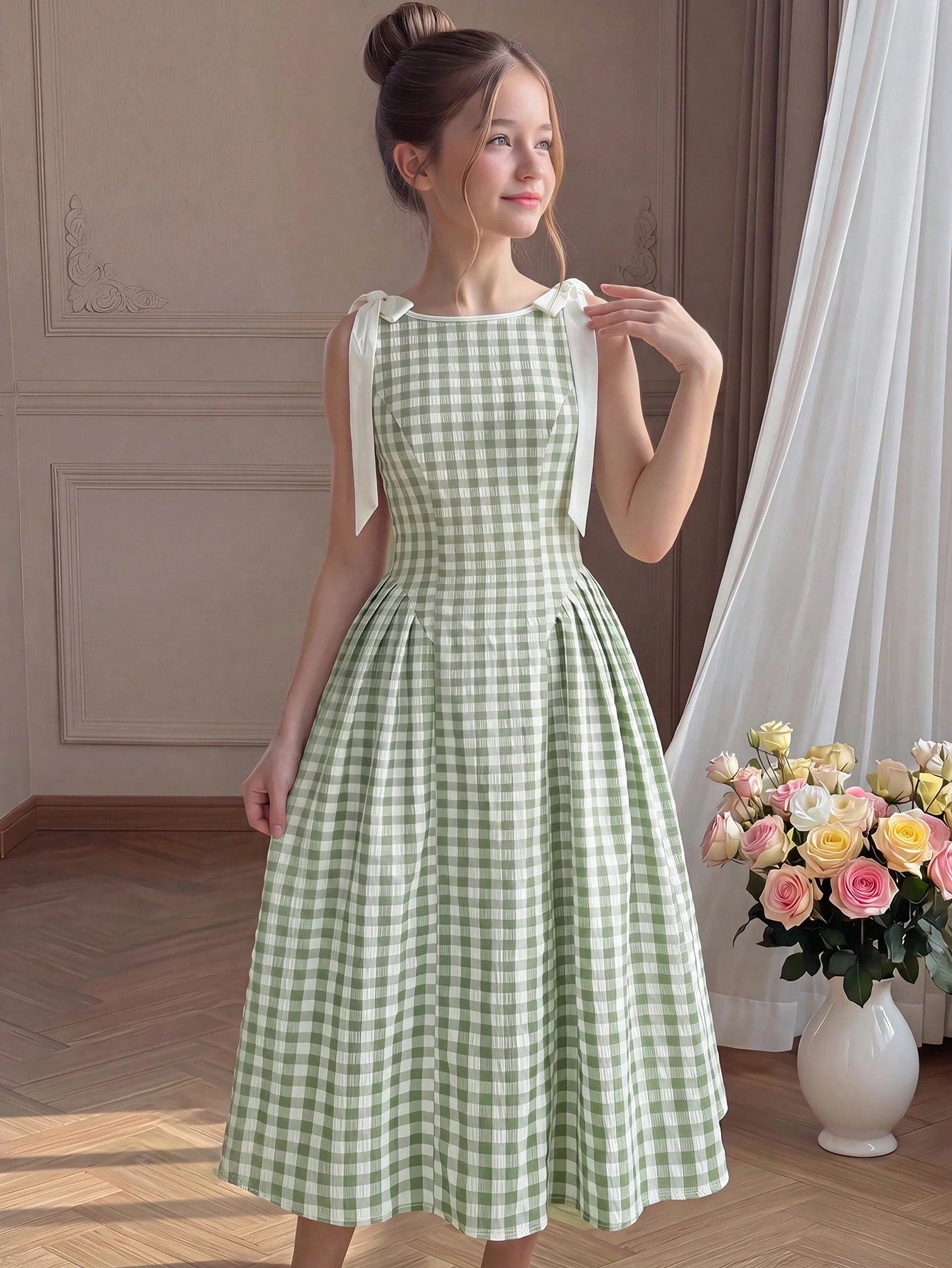 Tween girl green plaid modest sleeveless long dress featuring a round neckline, high waist, and flared A-line hem.