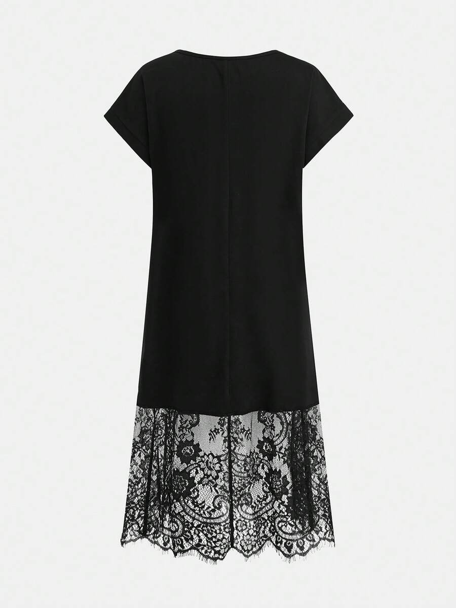 Tween girls casual black A-line long dress featuring short sleeves, a round neckline, and a decorative front bow with contrast lace trim.