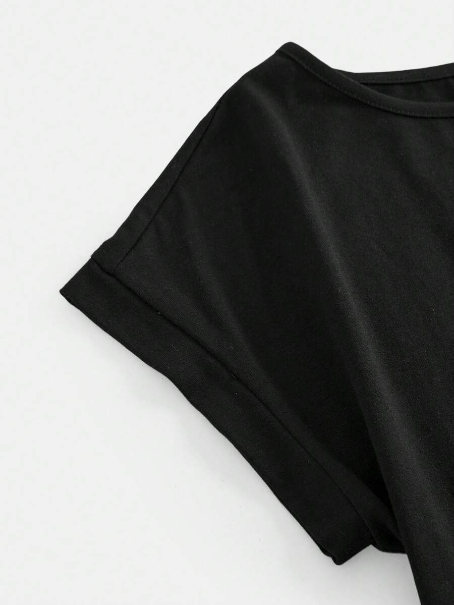 Tween girls casual black A-line long dress featuring short sleeves, a round neckline, and a decorative front bow with contrast lace trim.
