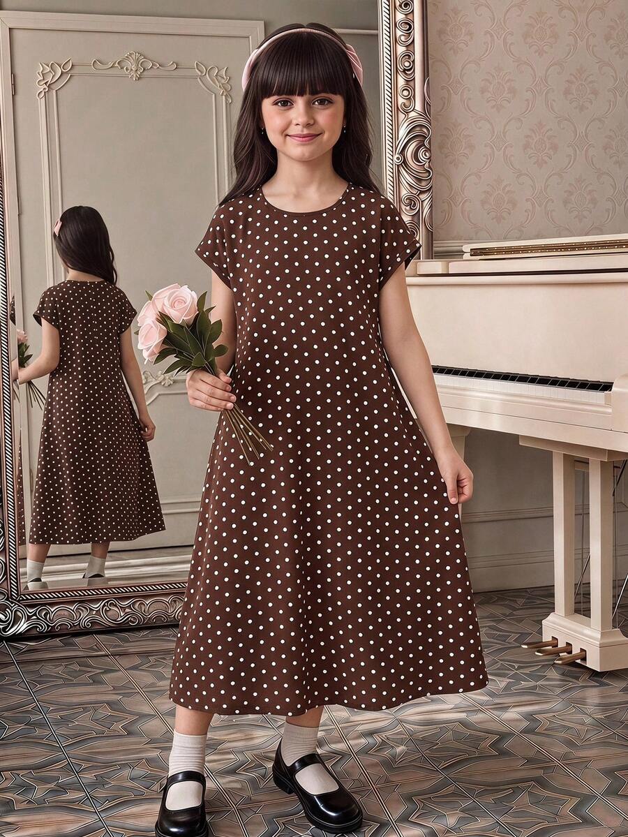 Tween girls casual black A-line long dress featuring short sleeves, a round neckline, and a decorative front bow with contrast lace trim.