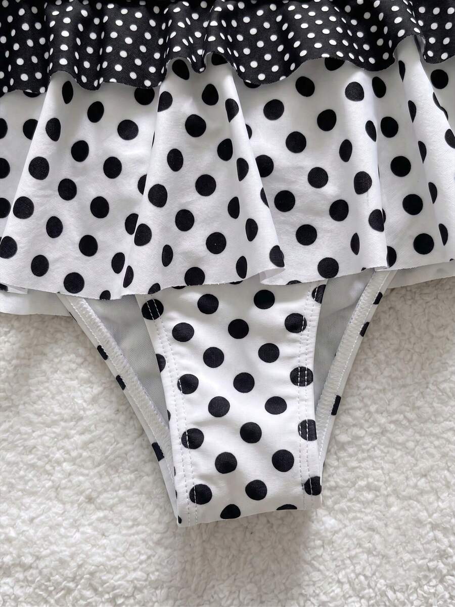 Women's ruffled halter two-piece bikini set with low waist bottoms and wireless triangle cups.