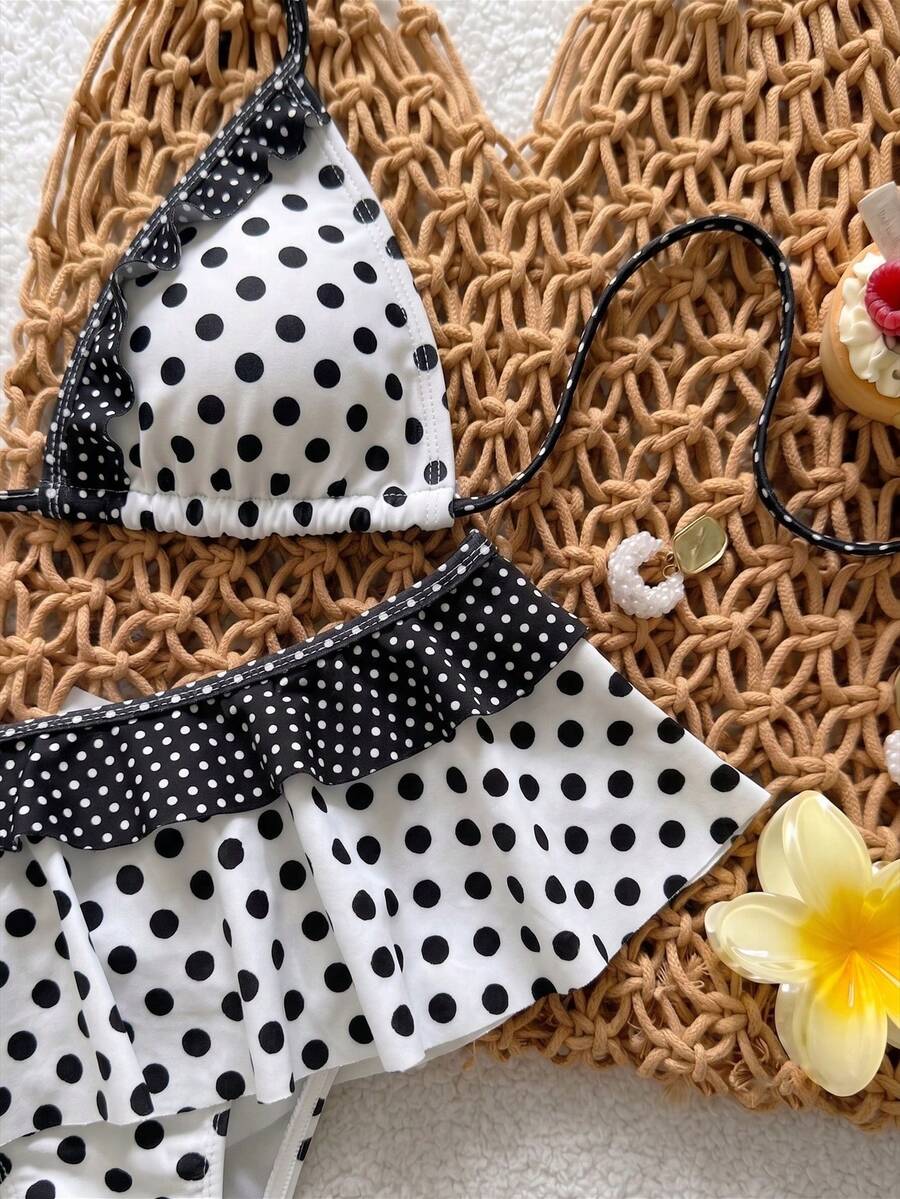 Women's ruffled halter two-piece bikini set with low waist bottoms and wireless triangle cups.