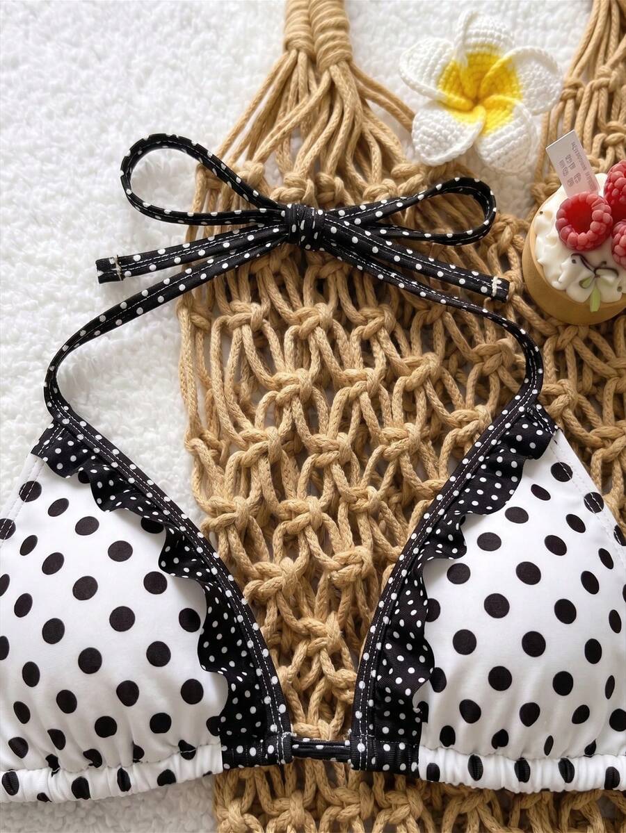 Women's ruffled halter two-piece bikini set with low waist bottoms and wireless triangle cups.