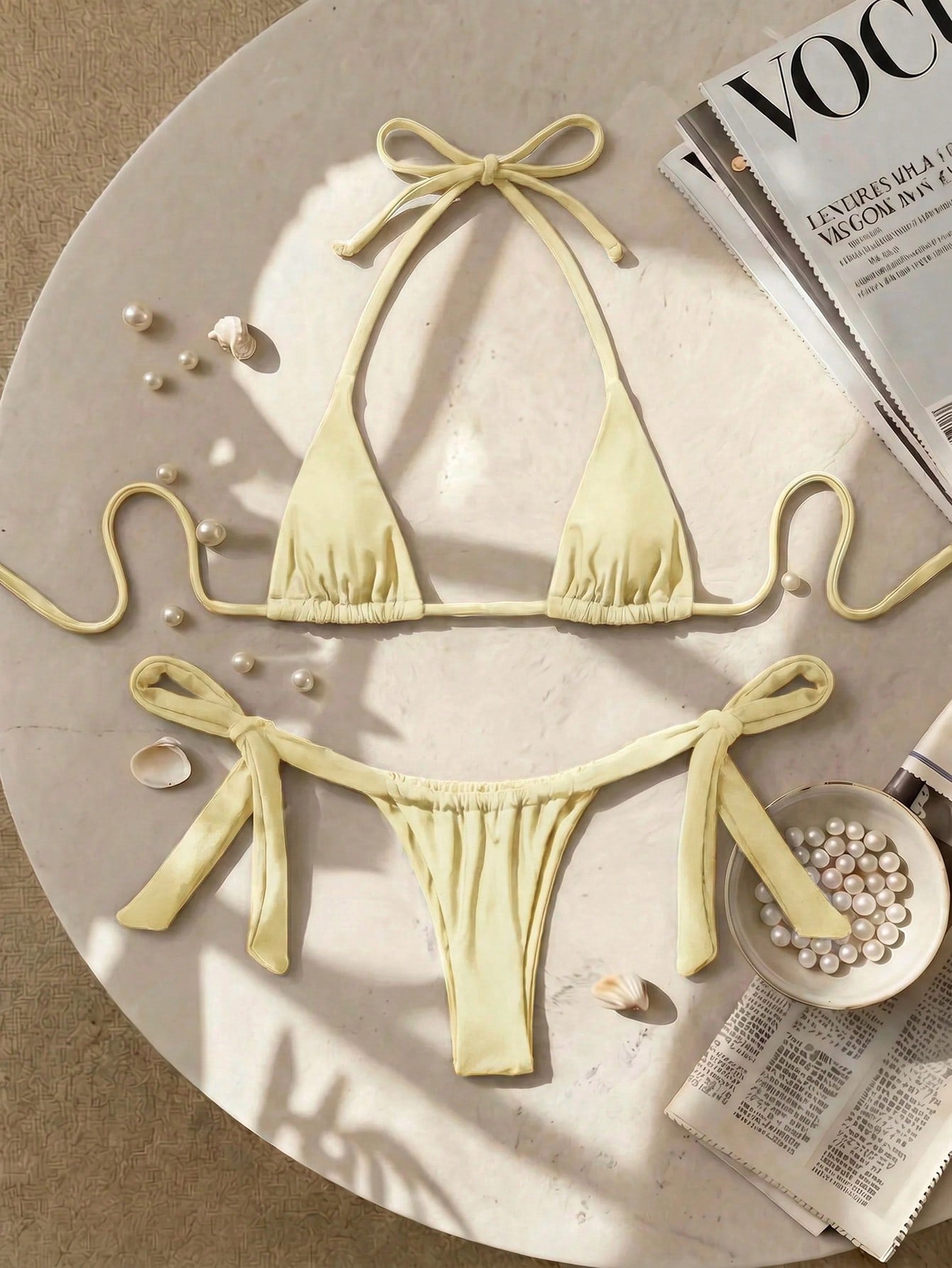 Army green high waist micro bikini swimsuit set for women featuring wireless spaghetti strap top with chain knot details and tie side thong bottoms.