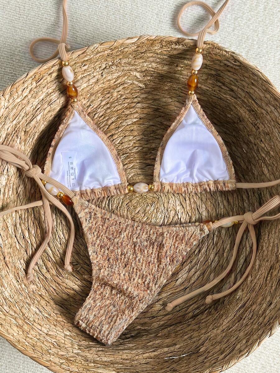 Multicolor textured beaded halter bikini set for women featuring wireless triangle cups with removable padding and ultra low waist tie side bottoms.