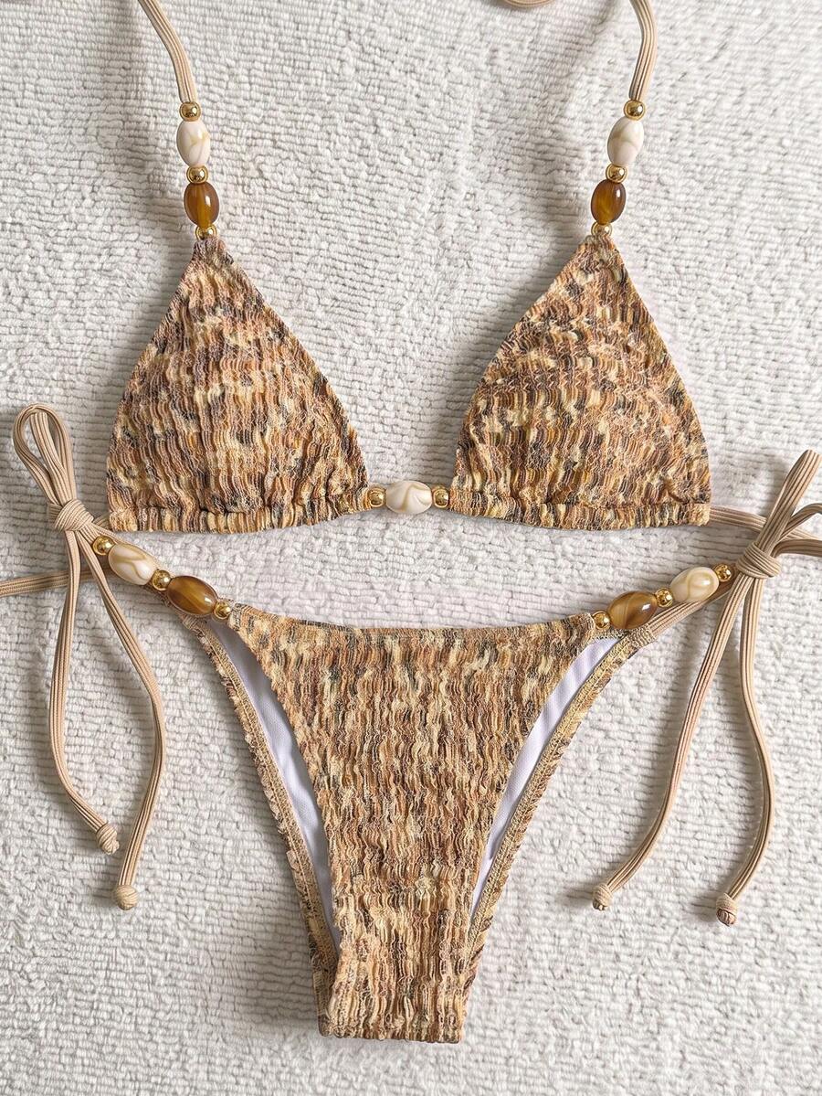 Multicolor textured beaded halter bikini set for women featuring wireless triangle cups with removable padding and ultra low waist tie side bottoms.