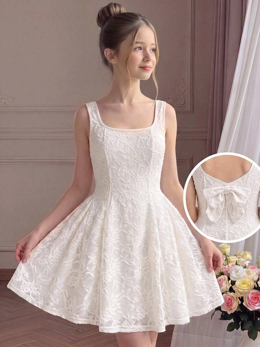 Apricot short-sleeve holiday party dress for tween girls featuring a square neckline, contrast lace details, high waist, flared A-line hem, and bowknot ruffle back detail.