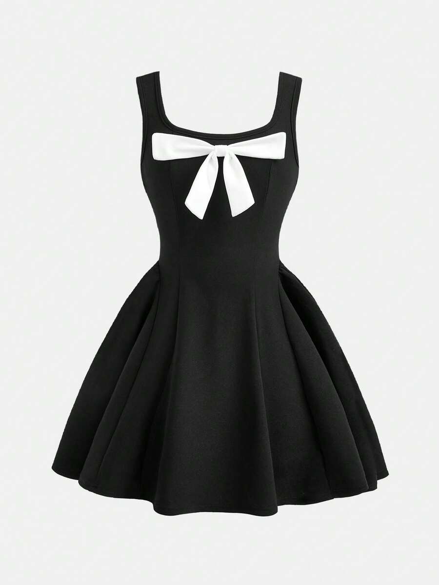 Apricot short-sleeve holiday party dress for tween girls featuring a square neckline, contrast lace details, high waist, flared A-line hem, and bowknot ruffle back detail.