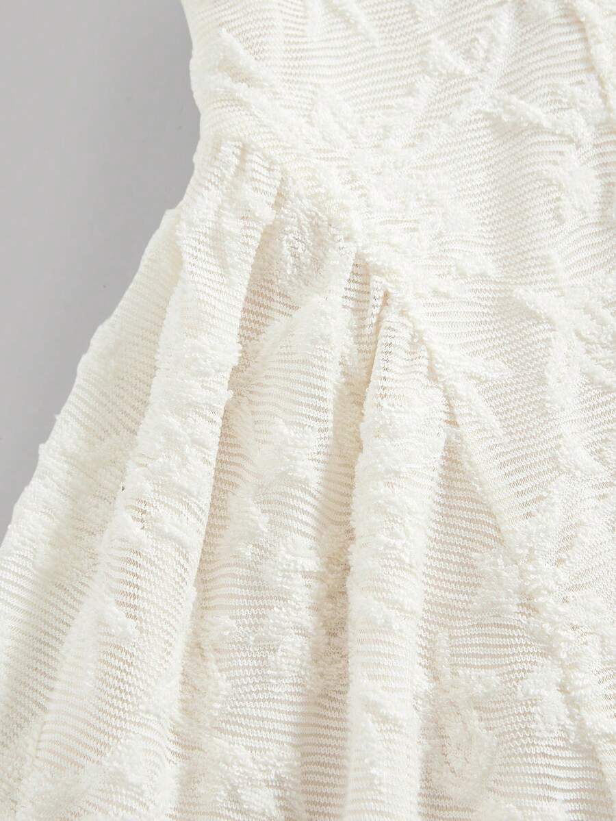 Apricot short-sleeve holiday party dress for tween girls featuring a square neckline, contrast lace details, high waist, flared A-line hem, and bowknot ruffle back detail.
