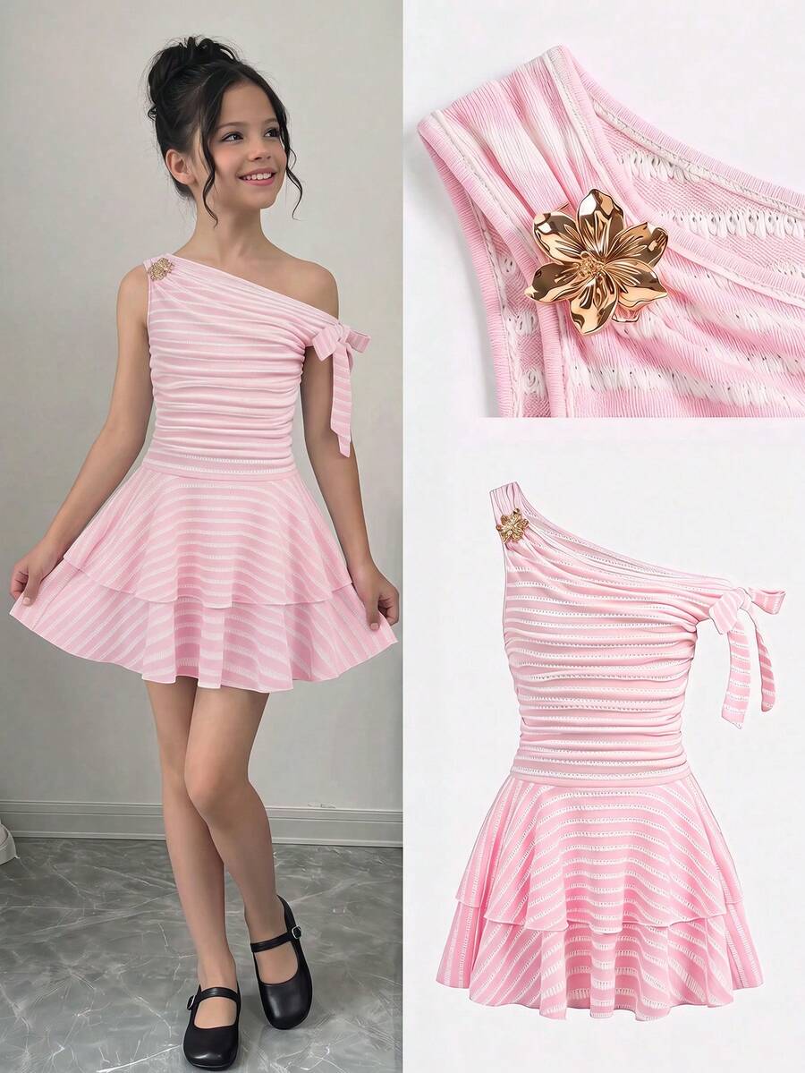Tween girl wearing an apricot asymmetrical tiered sleeveless party dress with an A-line silhouette.