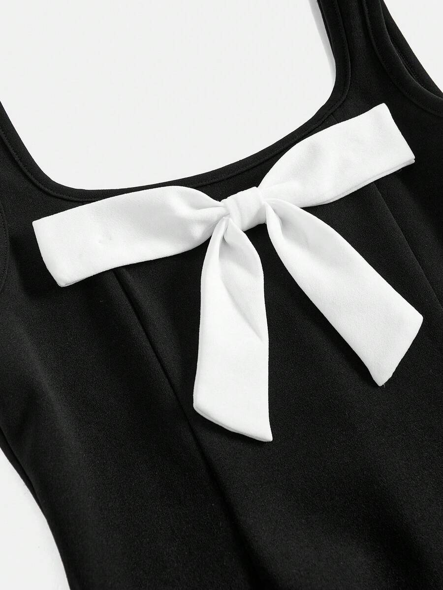 Apricot short-sleeve holiday party dress for tween girls featuring a square neckline, contrast lace details, high waist, flared A-line hem, and bowknot ruffle back detail.