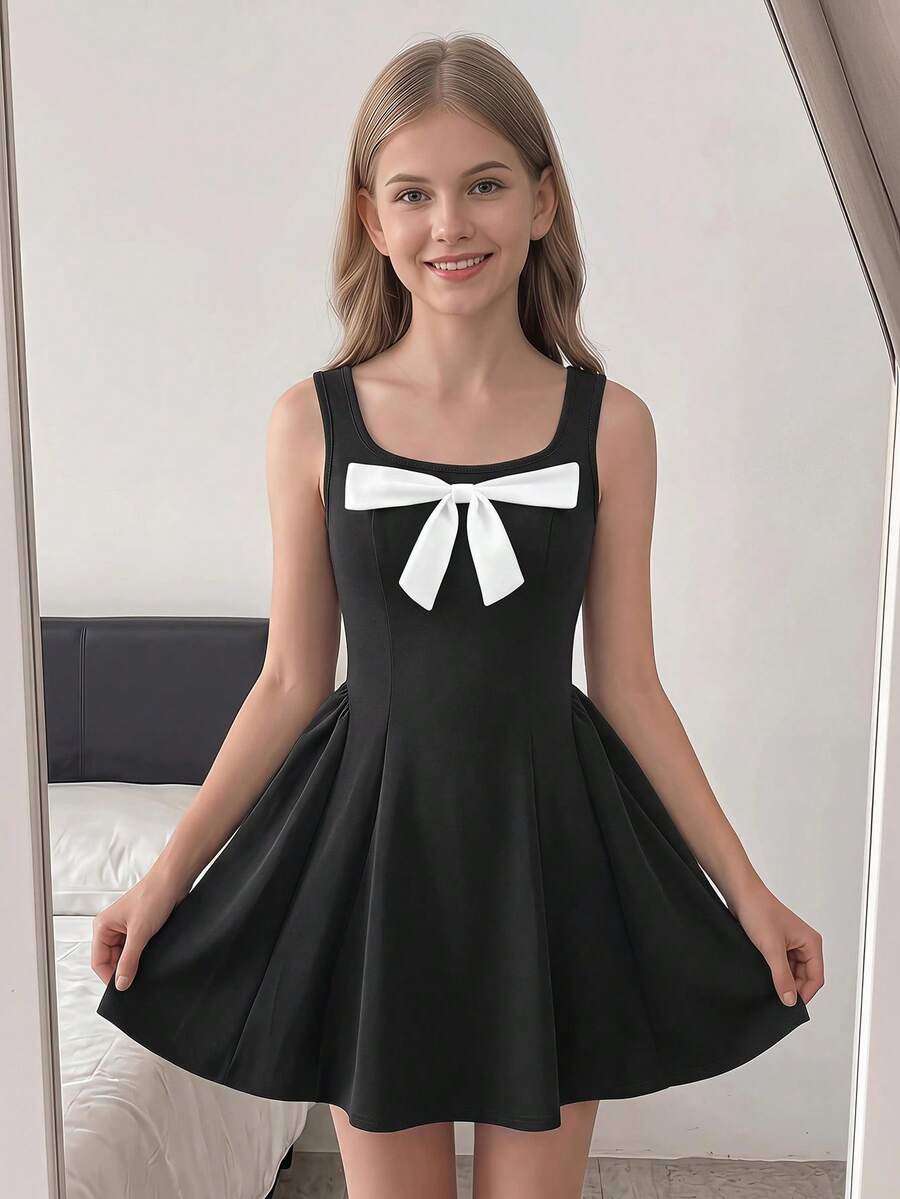 Apricot short-sleeve holiday party dress for tween girls featuring a square neckline, contrast lace details, high waist, flared A-line hem, and bowknot ruffle back detail.