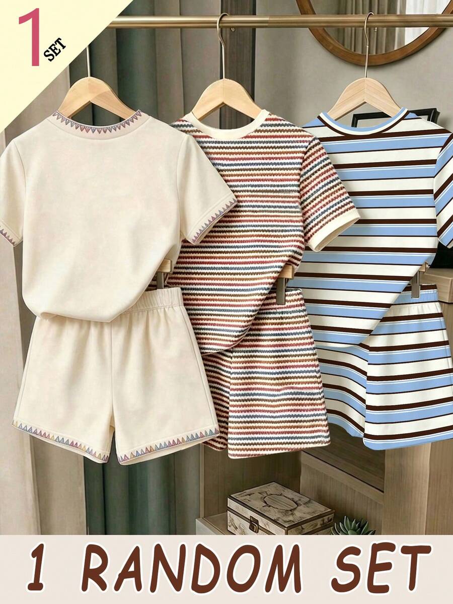 Girls' multicolor short sleeve T-shirt and shorts set featuring a cute cherry and bow print with round neck top and matching shorts.