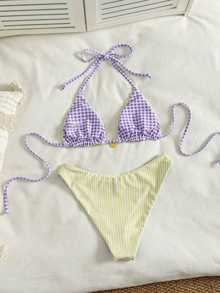 Women's black textured plaid 2-piece bikini set featuring a halter neckline, wireless triangle cups with removable padding, and mid-waist bottoms.